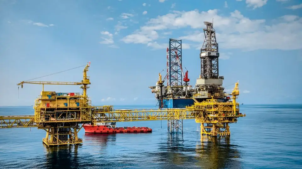 Offshore oil and gas platforms at sea